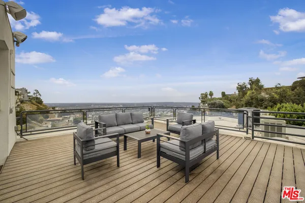 a view of a terrace with seating space