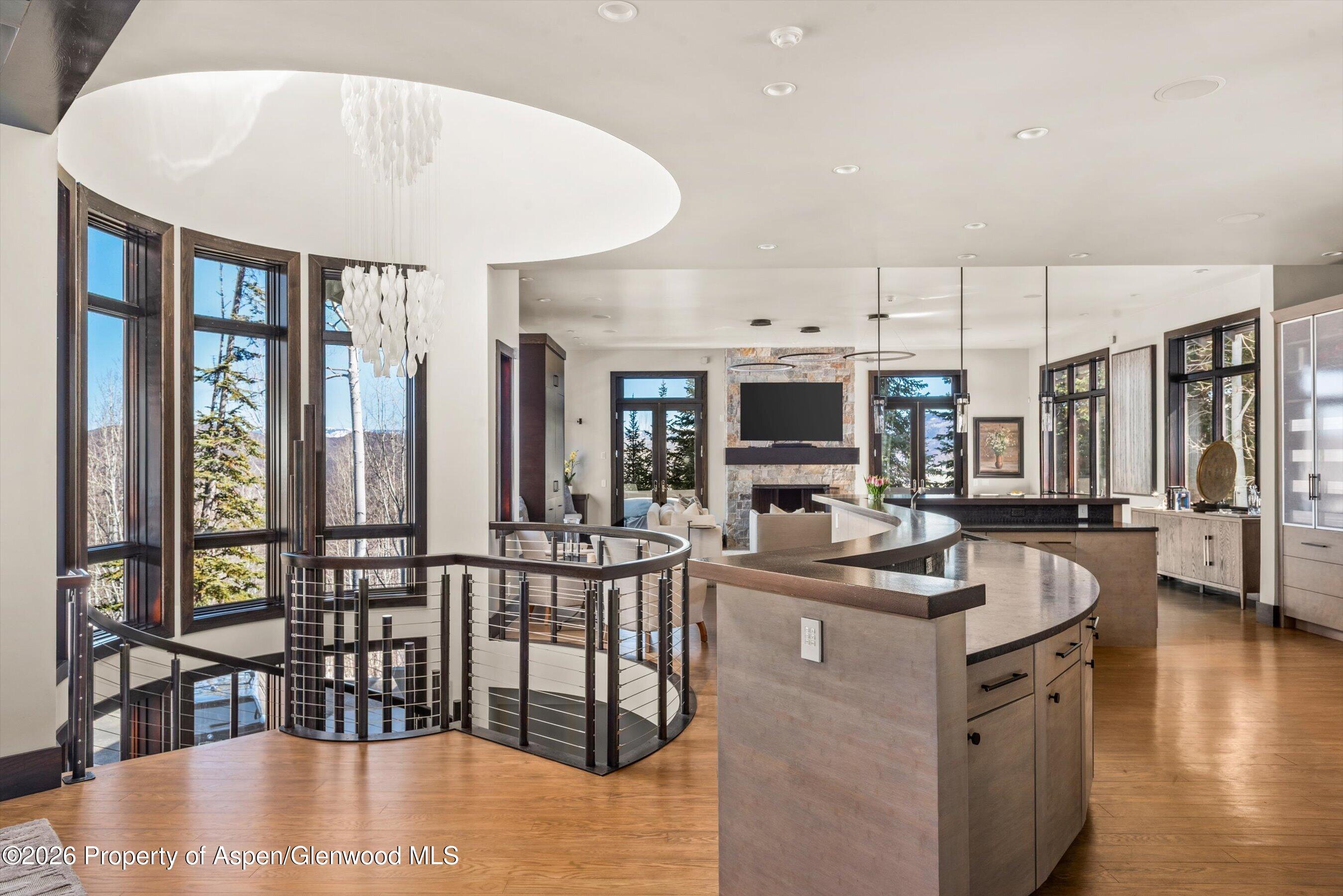 32 Elk Ridge Lane Snowmass Village, CO 81615 - Photo 12 of 58 a kitchen with stainless steel appliances granite countertop a stove and cabinets