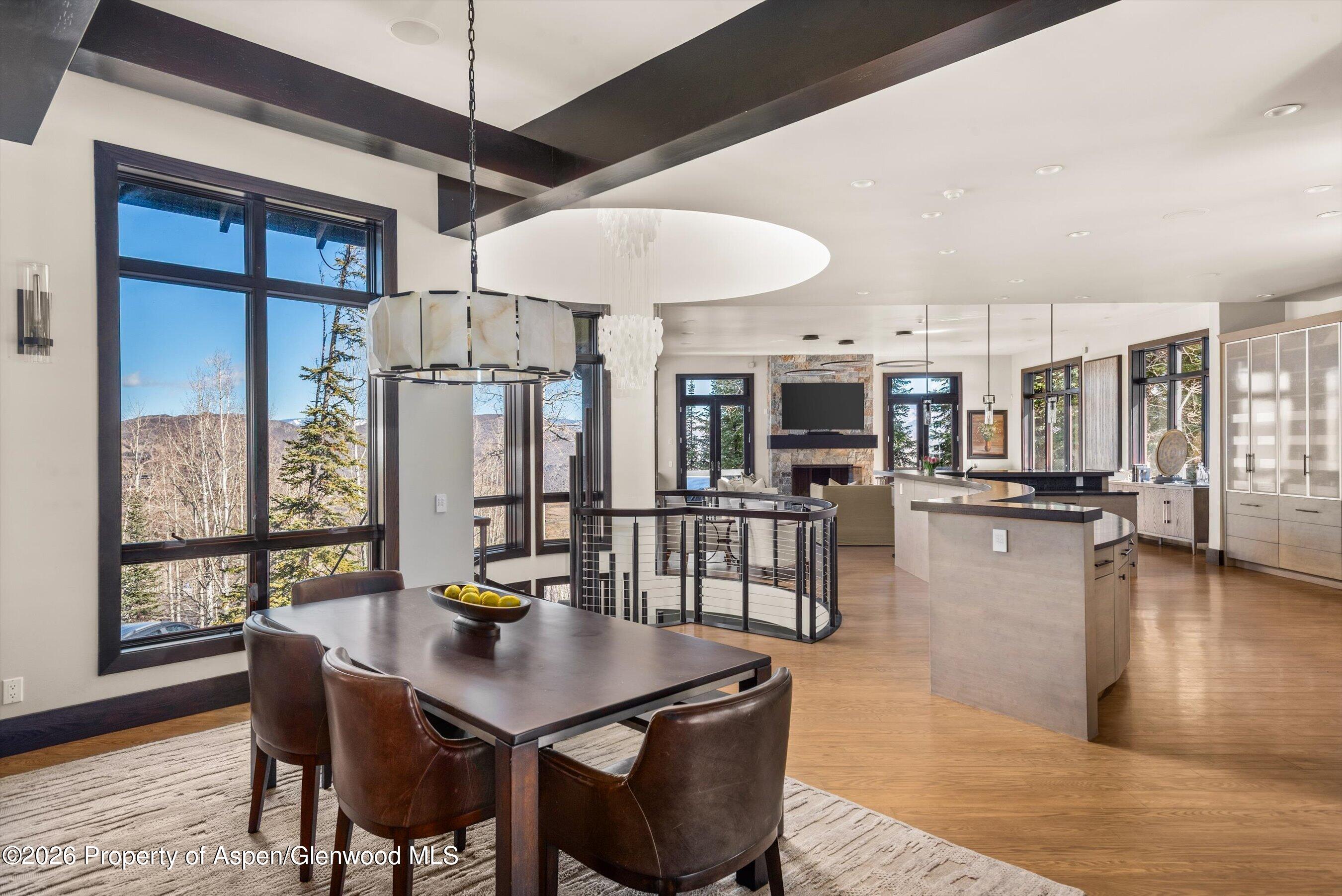 32 Elk Ridge Lane Snowmass Village, CO 81615 - Photo 13 of 58 a living room with furniture a wooden floor and a window