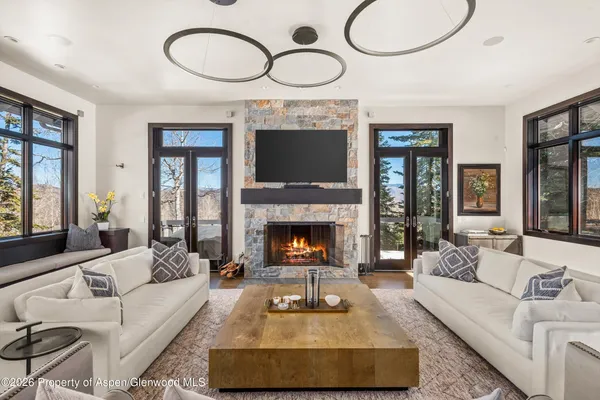 a kitchen with stainless steel appliances kitchen island granite countertop a sink and cabinets