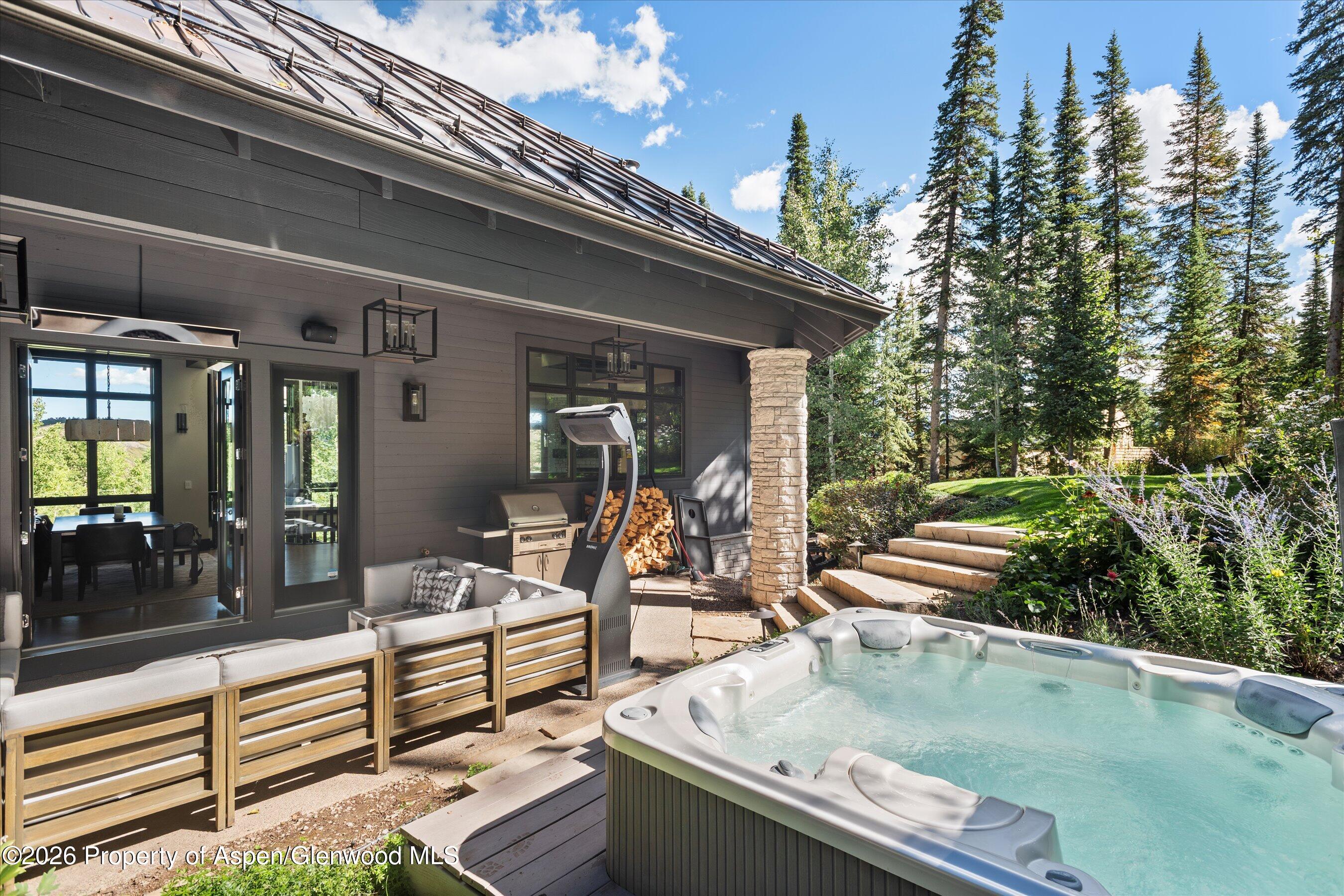 32 Elk Ridge Lane Snowmass Village, CO 81615 - Photo 48 of 58 a view of a swimming pool with chairs