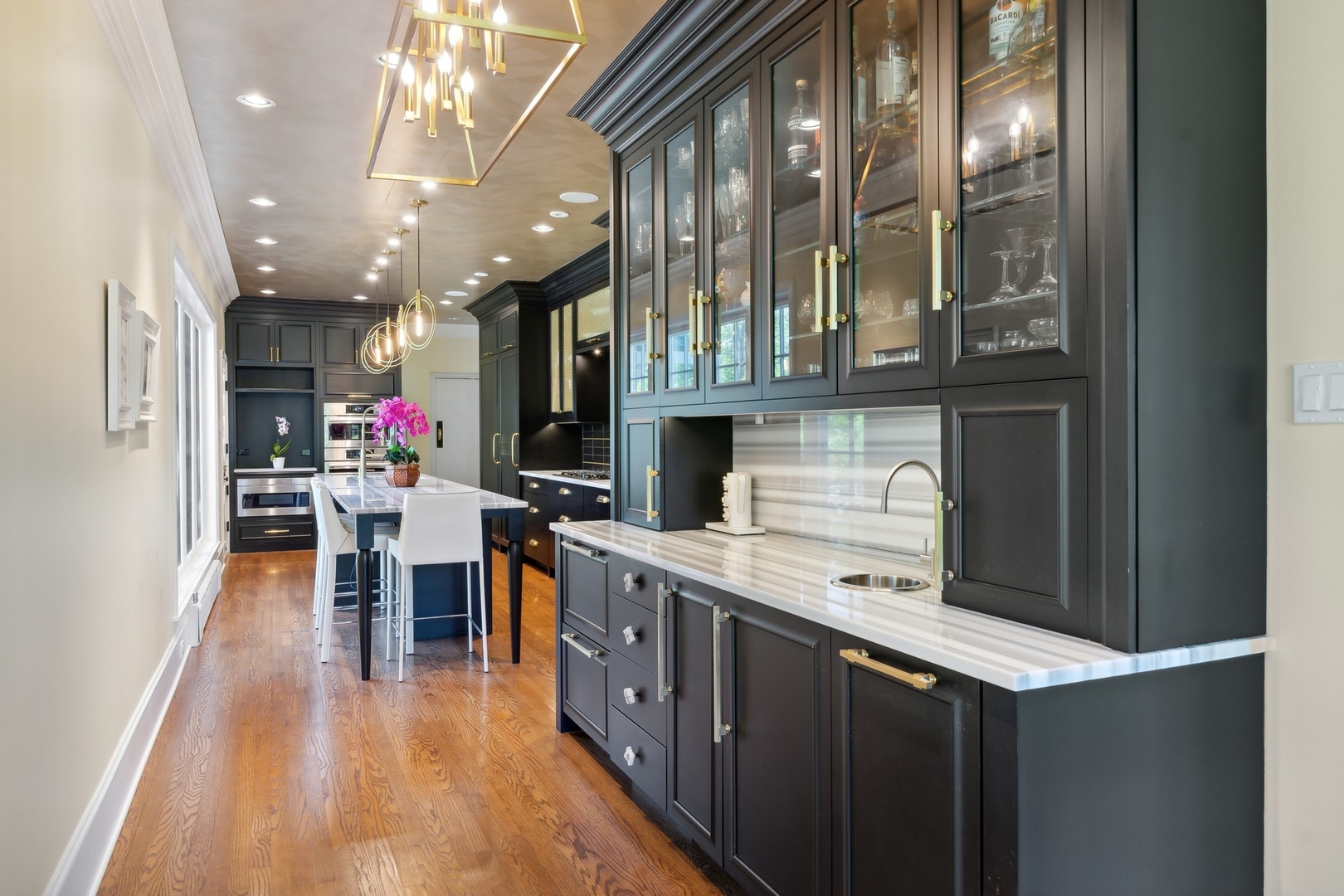 1900 Telegraph Road Bannockburn, IL 60015 - Photo 11 of 47 a kitchen with stainless steel appliances granite countertop a sink and cabinets