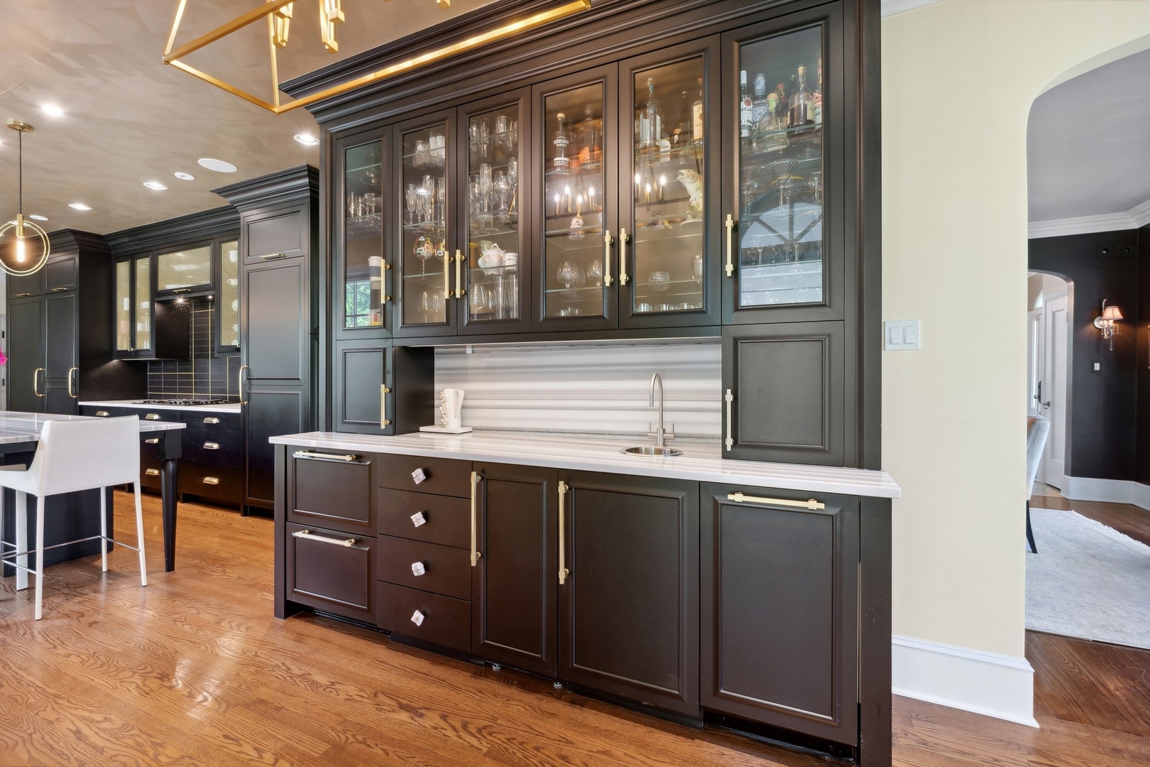 1900 Telegraph Road Bannockburn, IL 60015 - Photo 15 of 47 a kitchen with a sink and wooden cabinets
