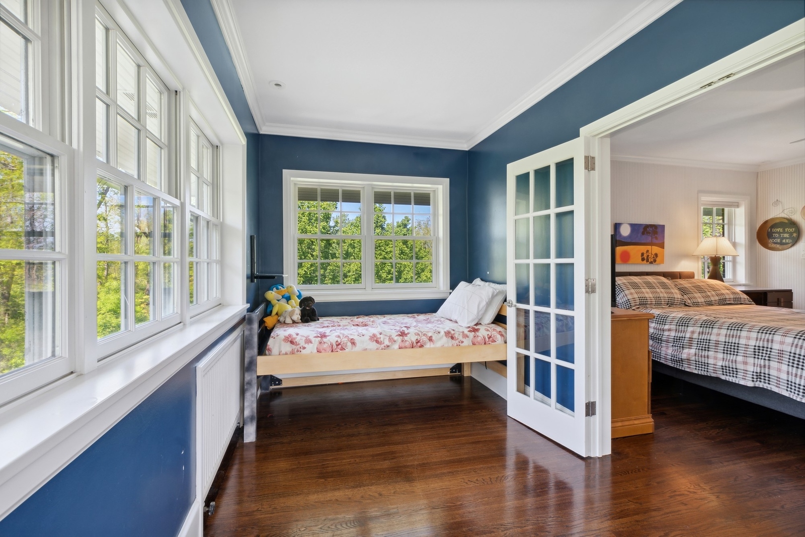 1900 Telegraph Road Bannockburn, IL 60015 - Photo 24 of 47 a bedroom with a bed and wooden floor