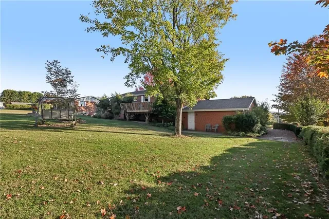 a house view with a garden space