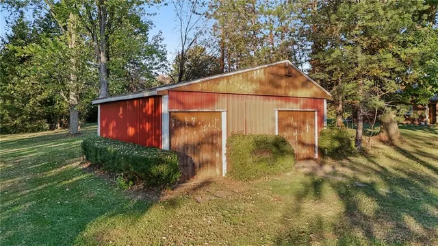 a backyard of a house with lots of green space