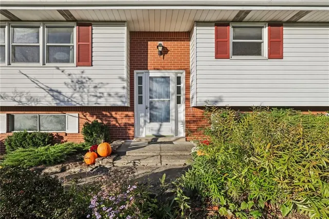 a front view of a house with an outdoor space