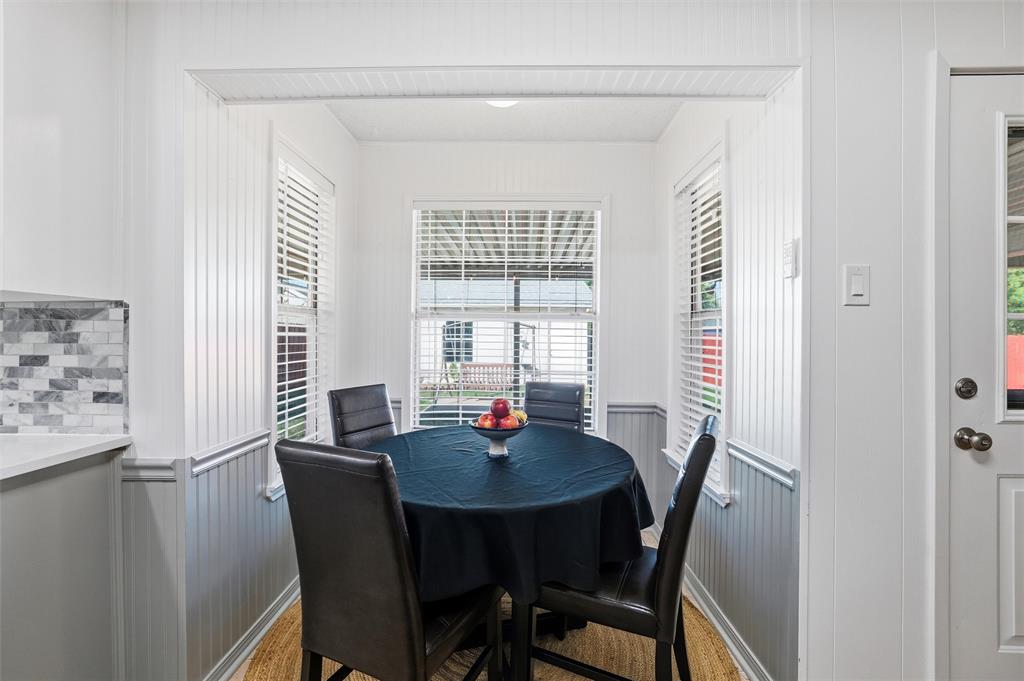 1801 Homestead Place Garland, TX 75044 - Photo 14 of 37 a view of a dining room with furniture and window