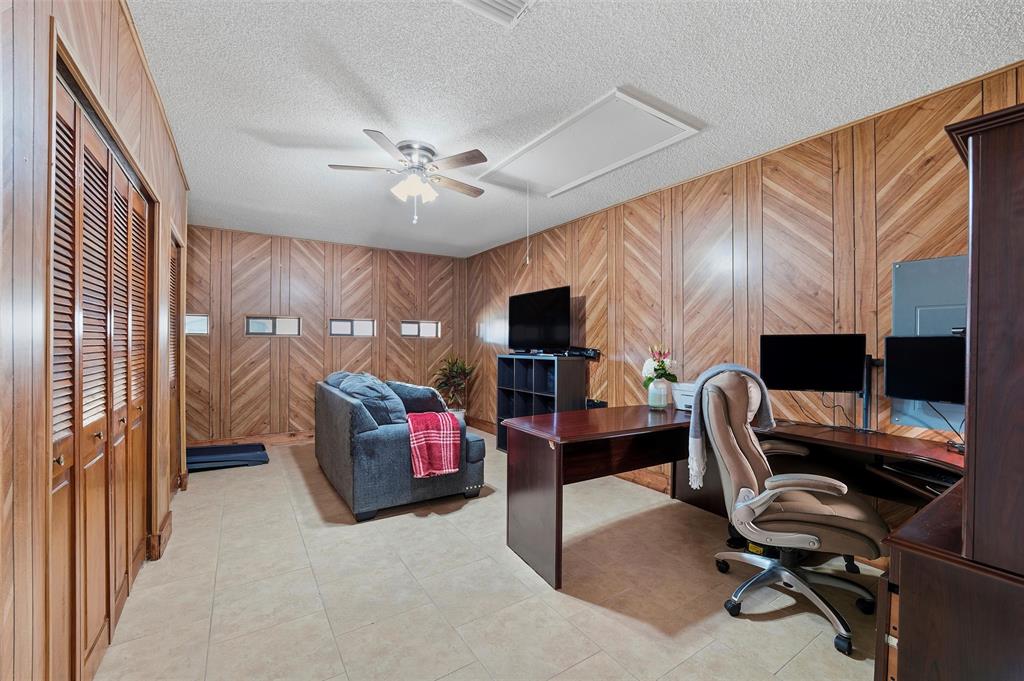 1801 Homestead Place Garland, TX 75044 - Photo 27 of 37 a bedroom with furniture and a window