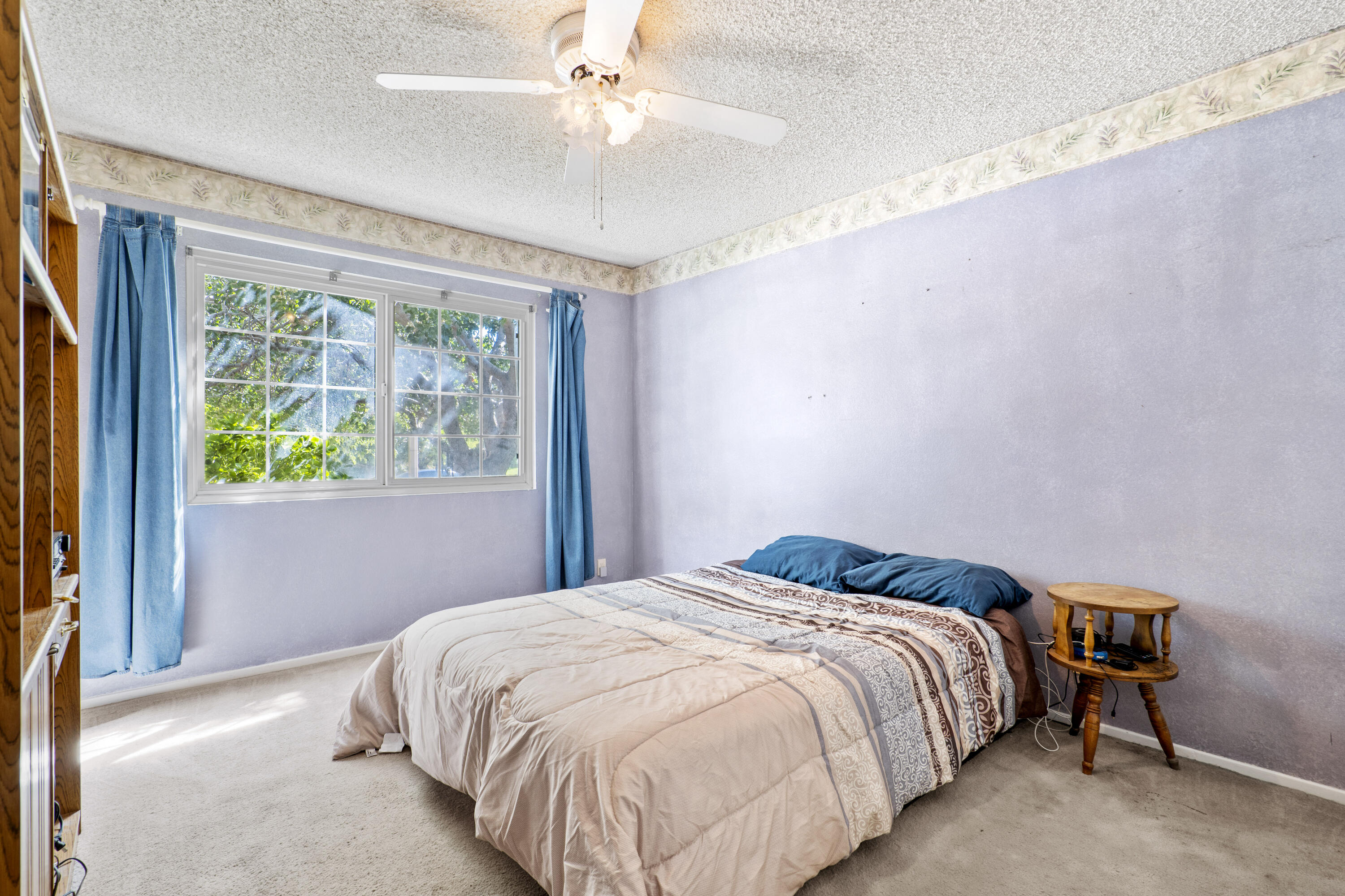 41235 47th Street West Lancaster, CA 93536 - Photo 20 of 43 a bedroom with a bed and a large window
