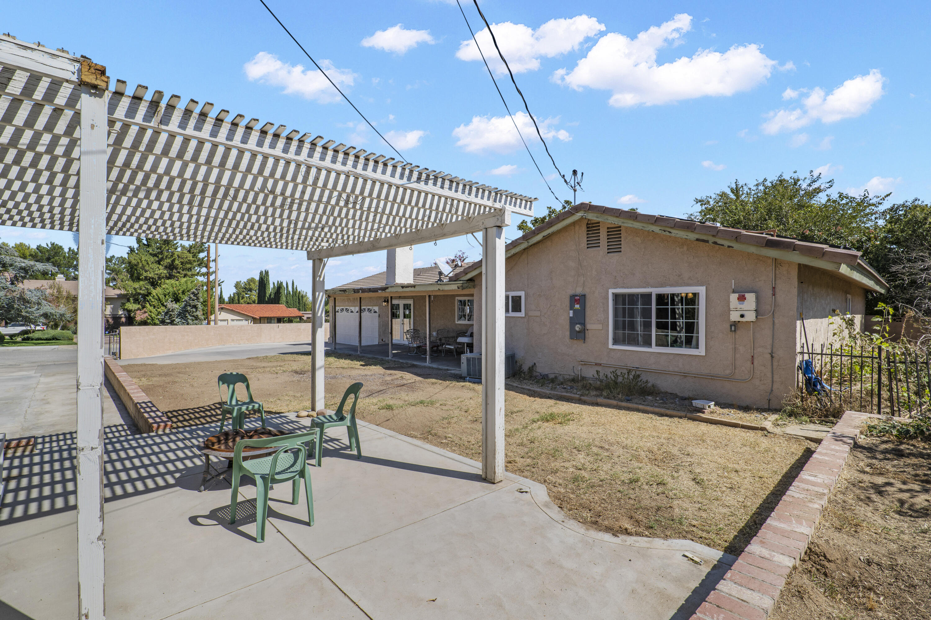 41235 47th Street West Lancaster, CA 93536 - Photo 29 of 43 a view of a house with backyard and sitting area