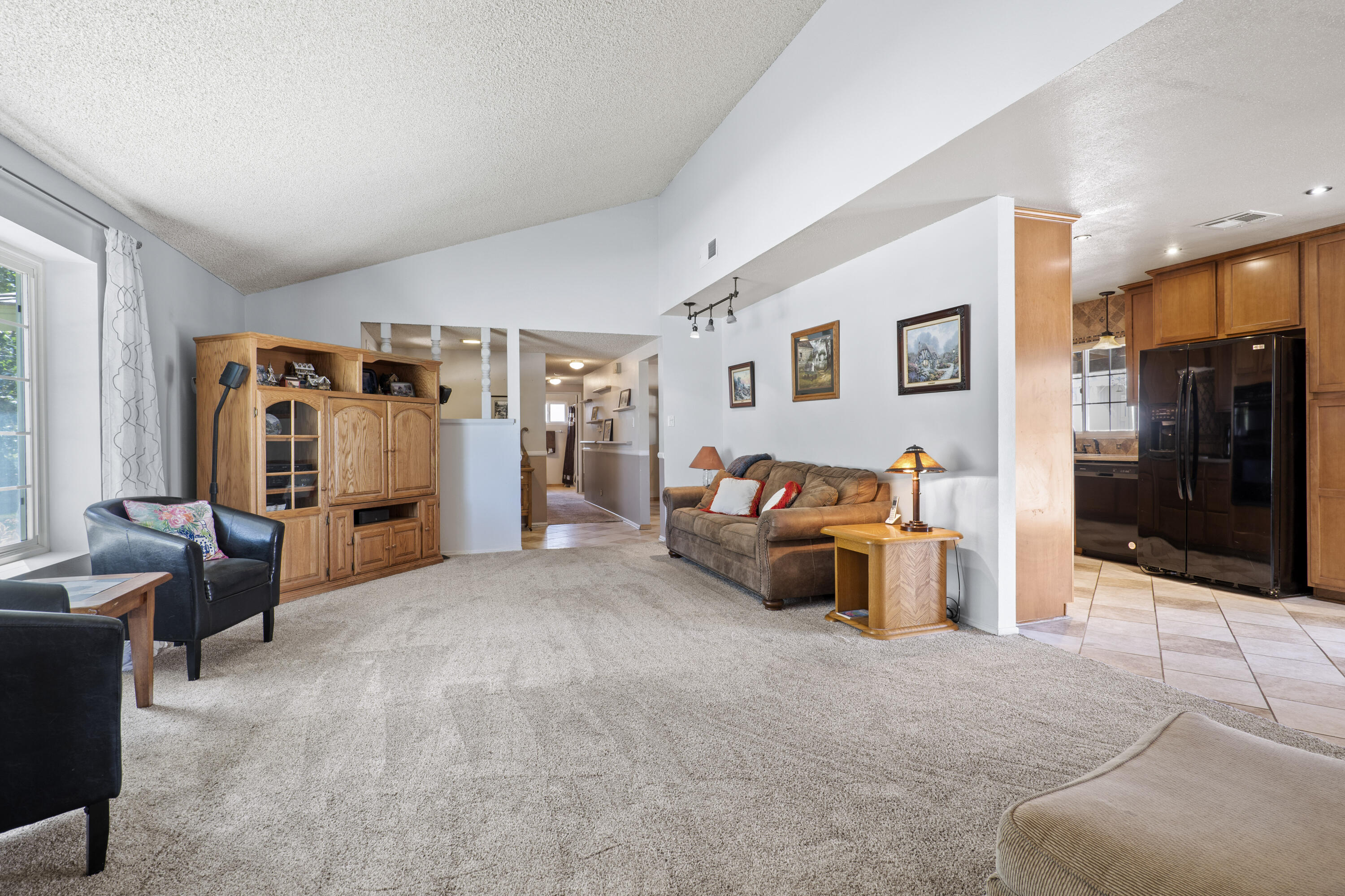 41235 47th Street West Lancaster, CA 93536 - Photo 3 of 43 a bed room with furniture and a couch