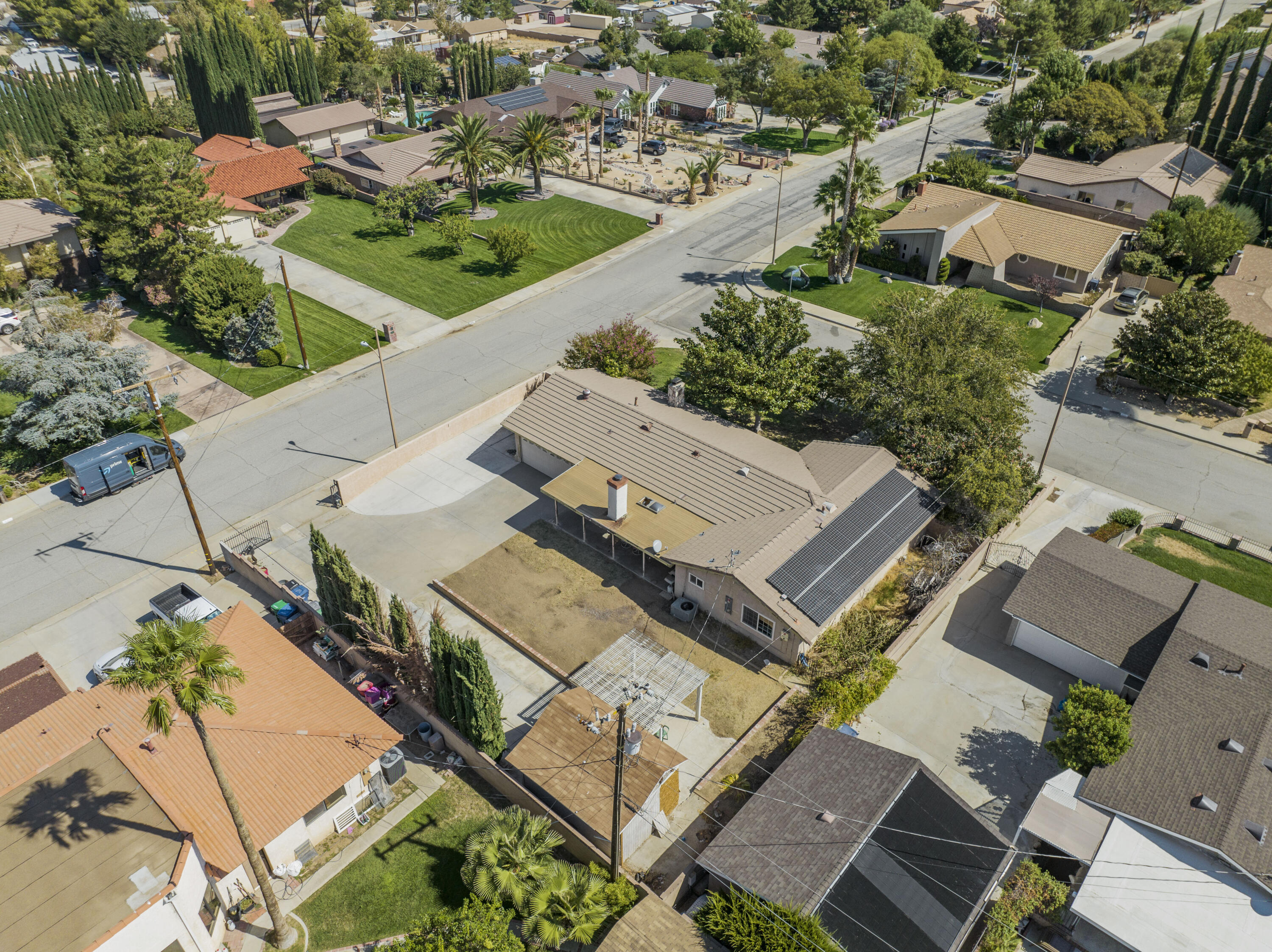 41235 47th Street West Lancaster, CA 93536 - Photo 37 of 43 an aerial view of a house with a yard