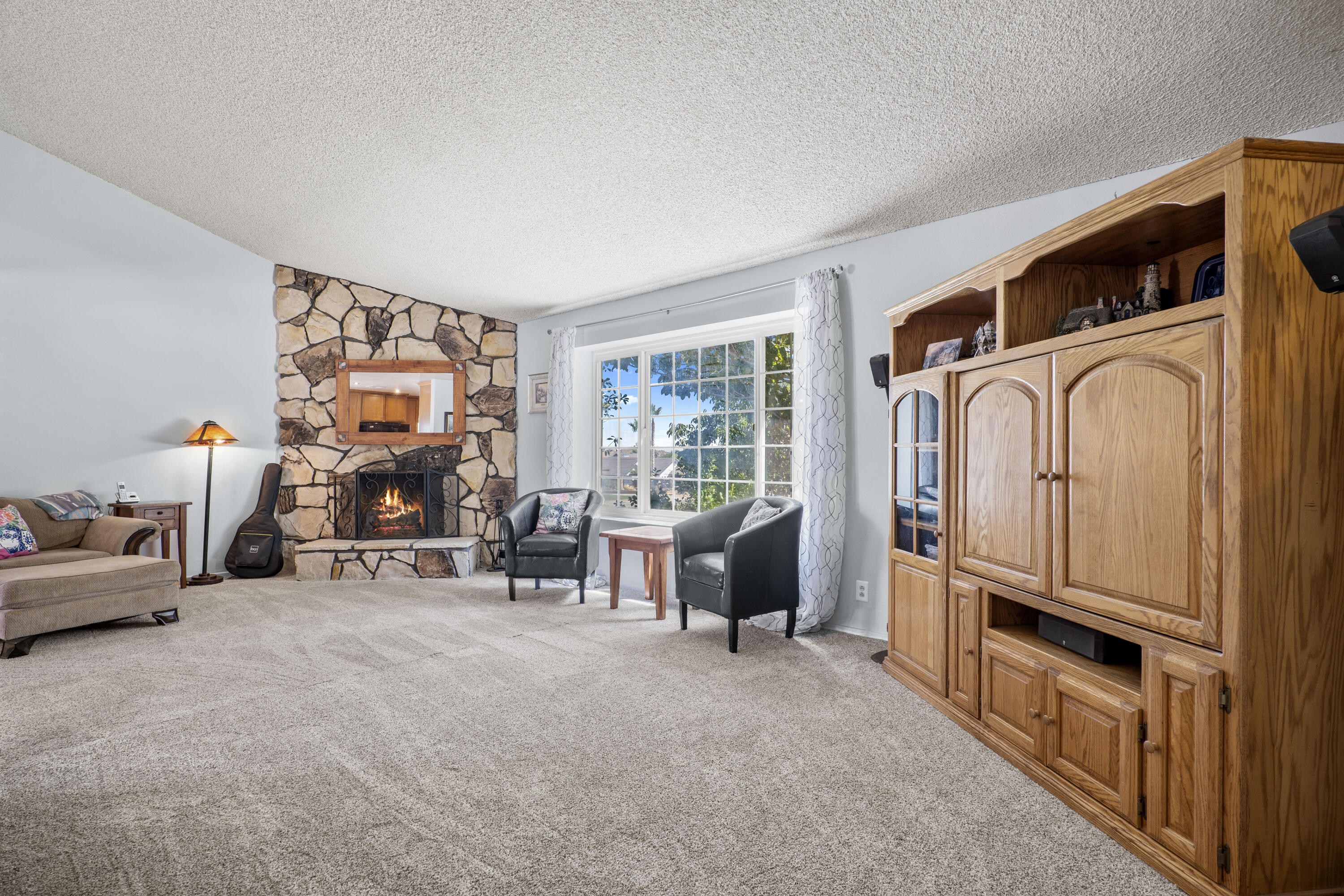 41235 47th Street West Lancaster, CA 93536 - Photo 4 of 43 a view of a livingroom with furniture and a window