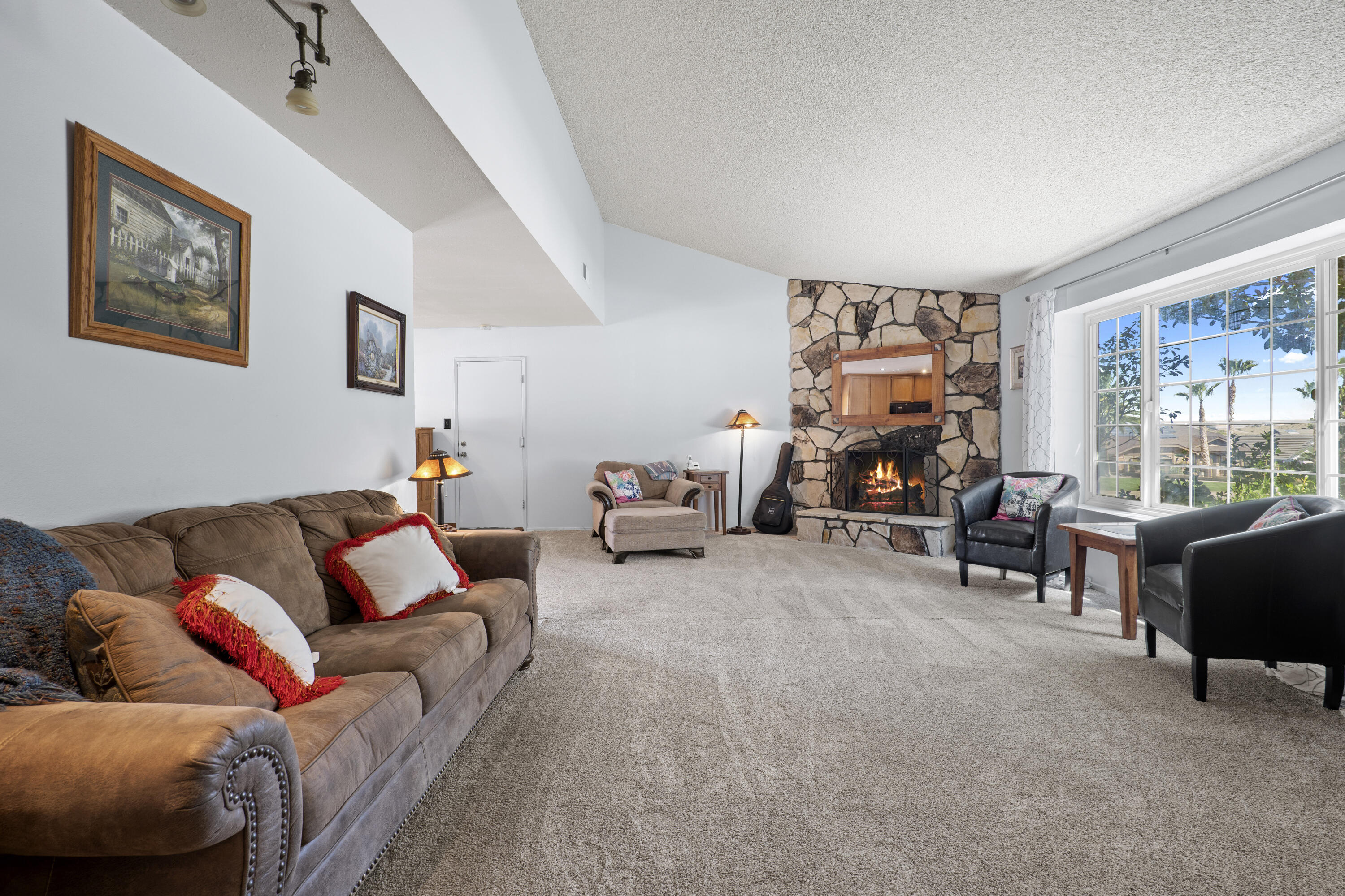 41235 47th Street West Lancaster, CA 93536 - Photo 7 of 43 a living room with furniture and a large window