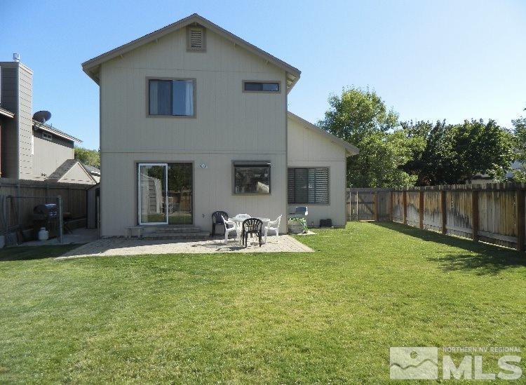 5885 Starcrest Avenue Reno, NV 89523 - Photo 3 of 18 a front view of house with yard and seating area