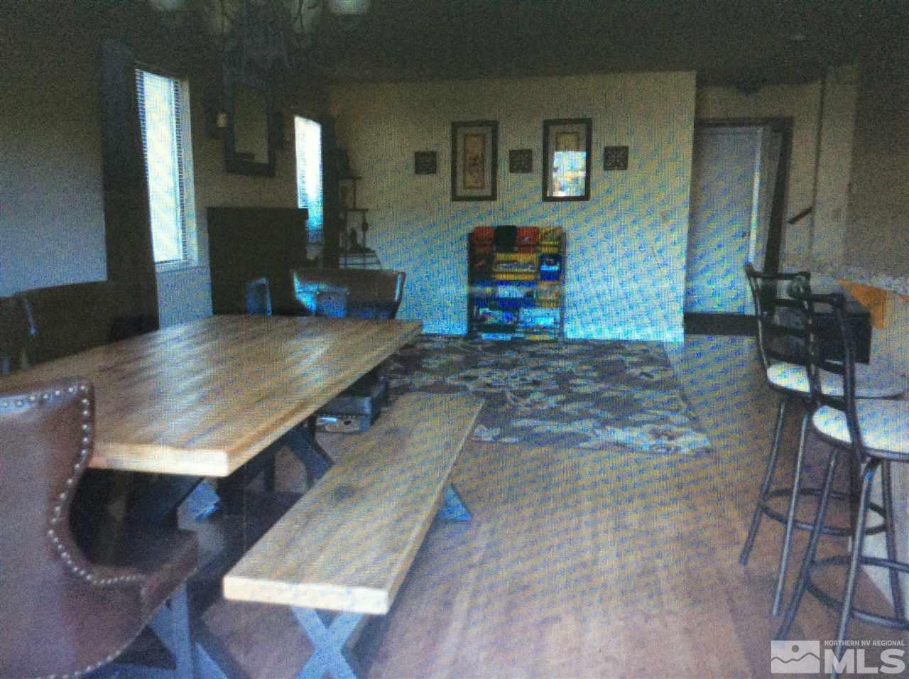 5885 Starcrest Avenue Reno, NV 89523 - Photo 6 of 18 a room with furniture and wooden floor