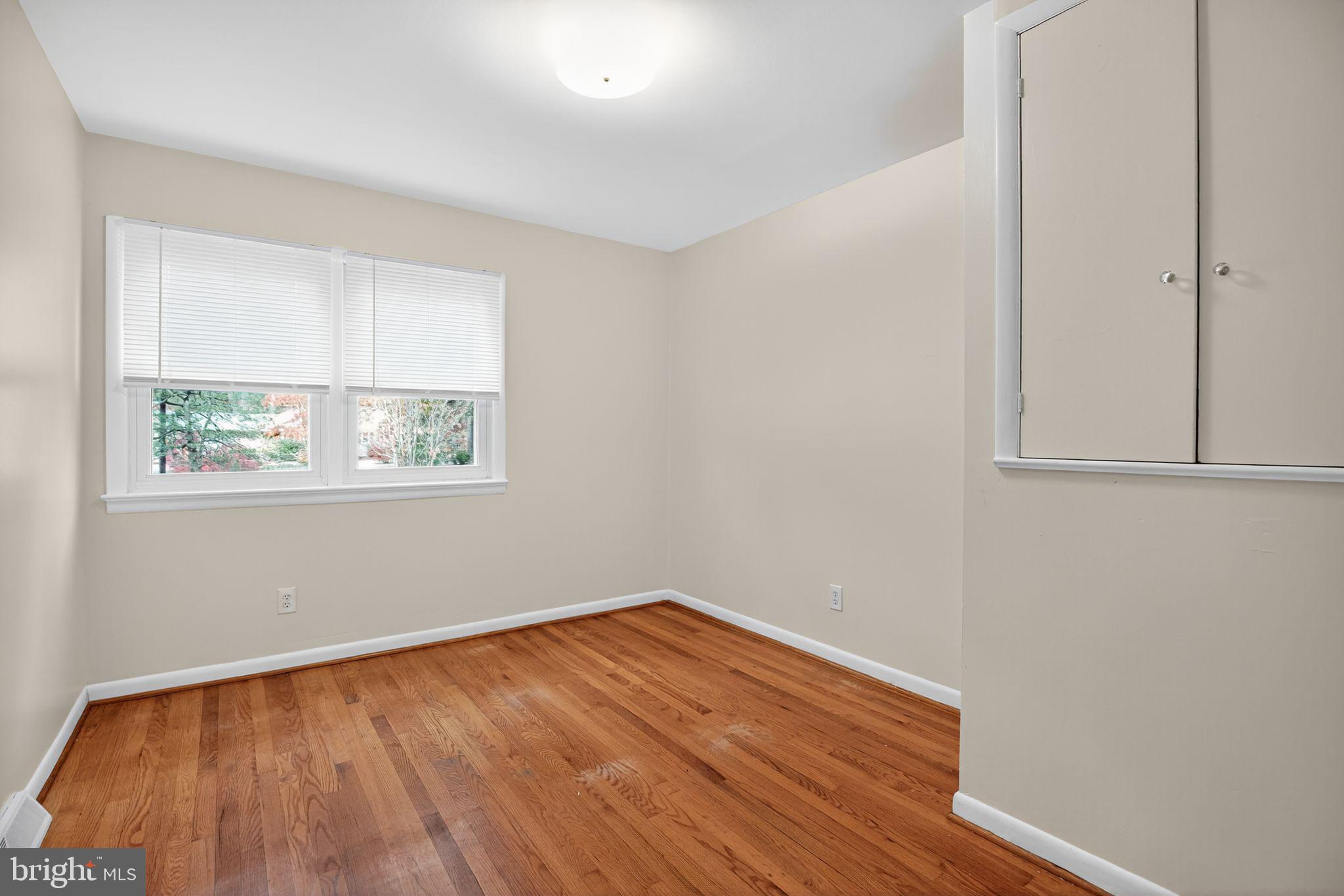 45869 Belvoir Road Great Mills, MD 20634 - Photo 15 of 30 wooden floor in an empty room with a window