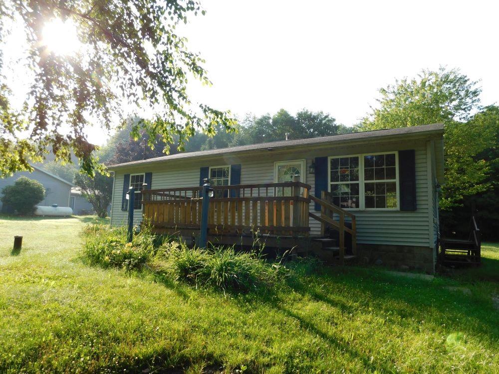 3435 East State Road Jamestown, PA 16134 - Photo 1 of 9 a view of house with backyard and garden