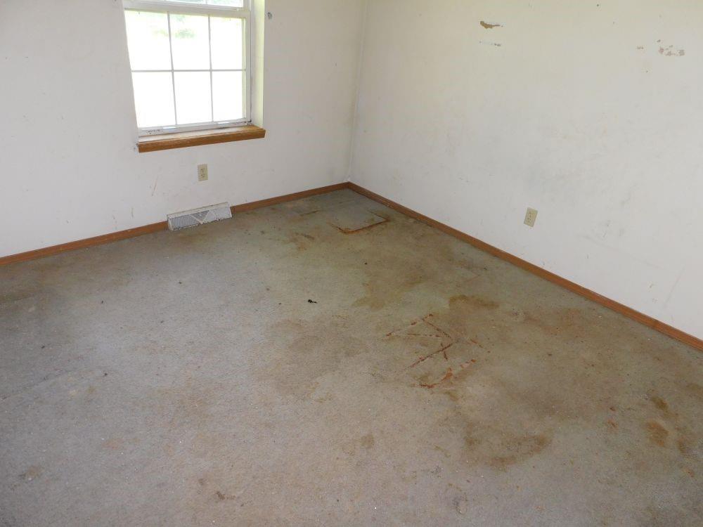 3435 East State Road Jamestown, PA 16134 - Photo 5 of 9 an empty room with a window