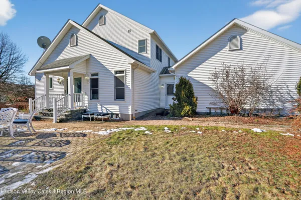 a view of a house with snow on the ground