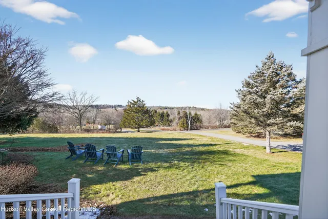 a view of a lake with a yard