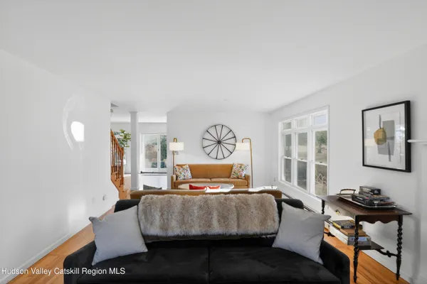 a living room with furniture and window