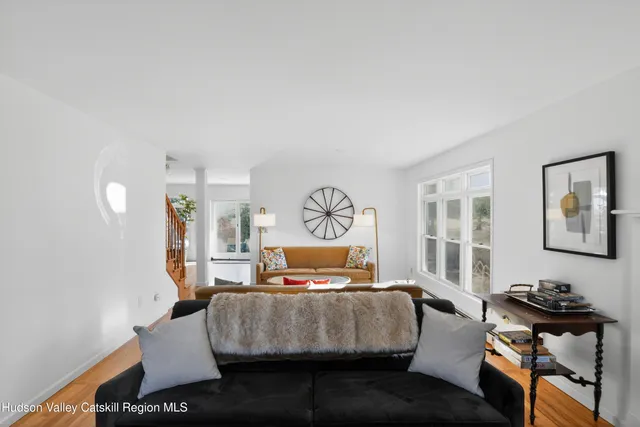a living room with furniture and window