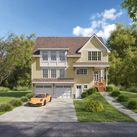 front view of a house with a yard