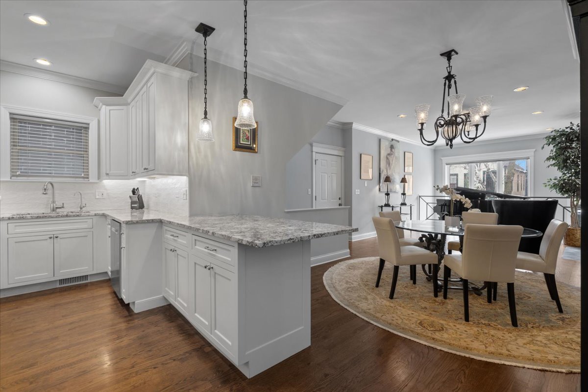 2619 North Seminary Avenue, Unit 1 Chicago, IL 60614 - Photo 10 of 34 a view of a dining room with furniture window and wooden floor