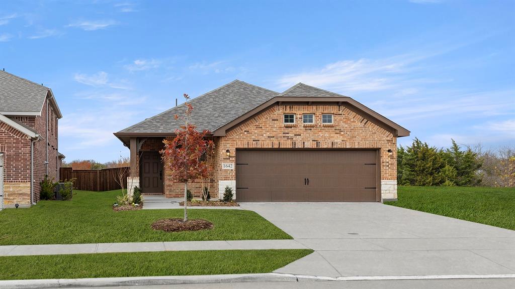 1642 Gracehill Way Forney, TX 75126 - Photo 1 of 1 a view of a house with a yard