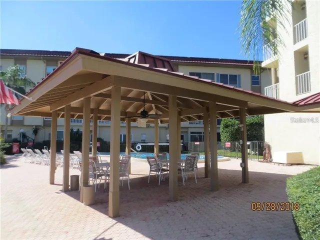 a view of a building with a patio