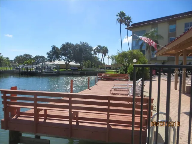 a view of a swimming pool with a lake view