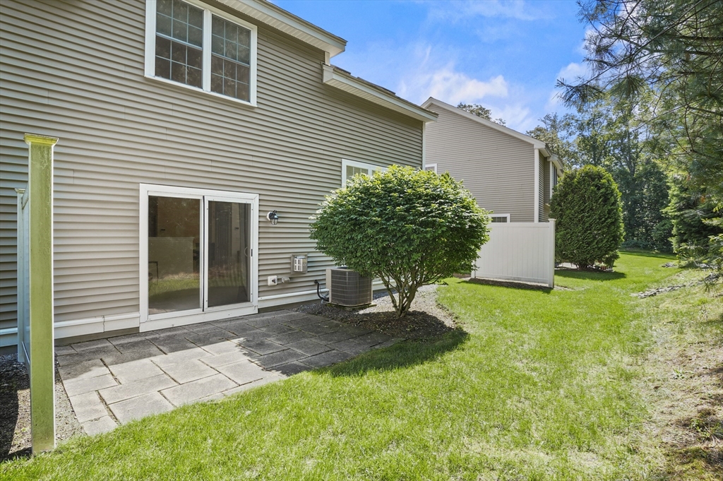 508 Linwood Court, Unit 508 Clinton, MA 01510 - Photo 29 of 32 a front view of a house with garden