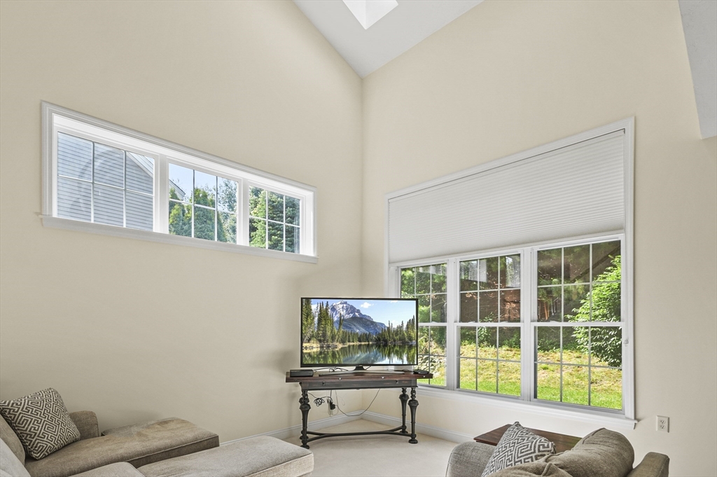 508 Linwood Court, Unit 508 Clinton, MA 01510 - Photo 9 of 32 a living room with furniture and a window