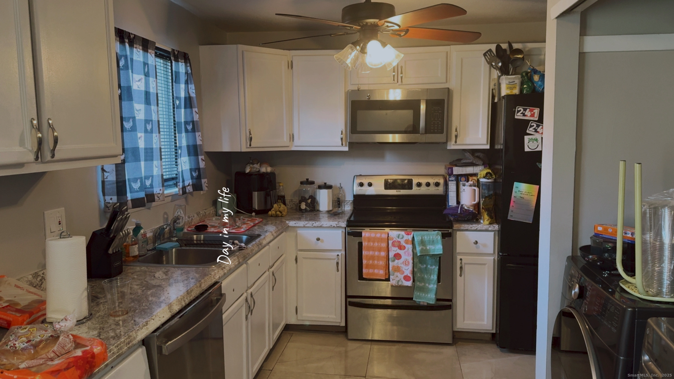 268 High Path Road, Unit 268 Windsor, CT 06095 - Photo 6 of 16 a kitchen with a sink a stove and cabinets