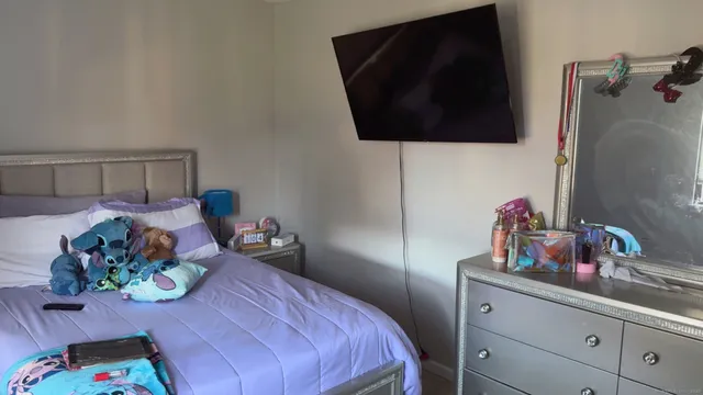 a dining room with furniture and a lamp