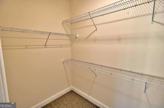 a view of a room with racks on the wall