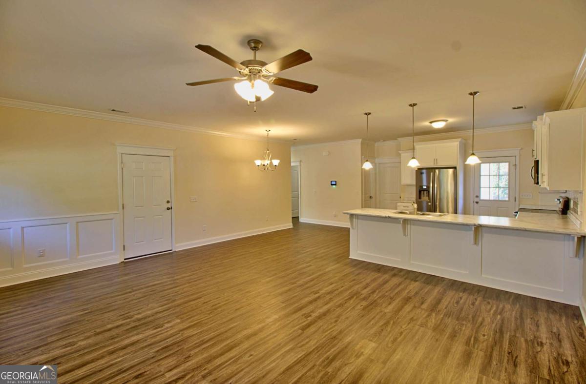 455 Bluff Road Jesup, GA 31545 - Photo 3 of 22 a large white kitchen with a large window