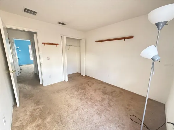a view of a room with an empty space