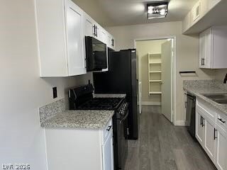 7885 West Flamingo Road, Unit 2004 Las Vegas, NV 89147 - Photo 4 of 23 This sleek kitchen features modern appliances and durable countertops, perfect for everyday living.