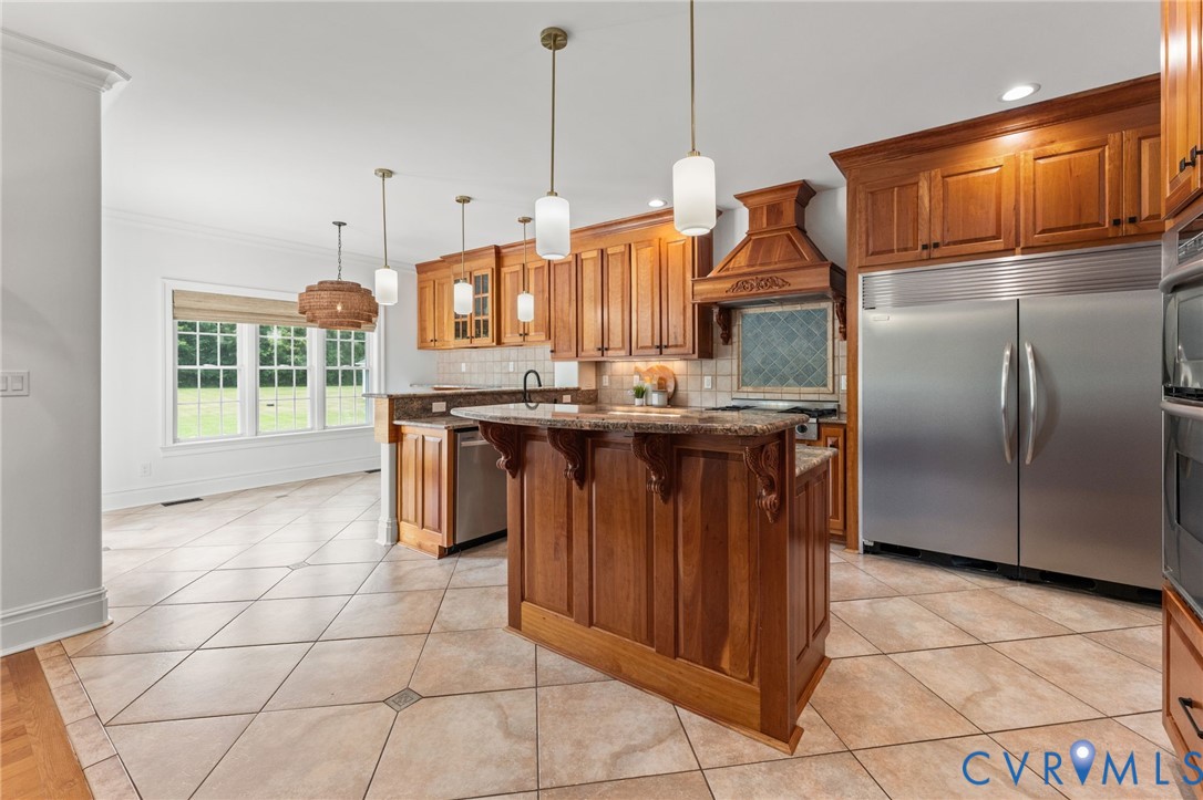 13446 Bradley Bridge Road Chester, VA 23831 - Photo 16 of 98 Custom built cabinetry. Island and bare with grani