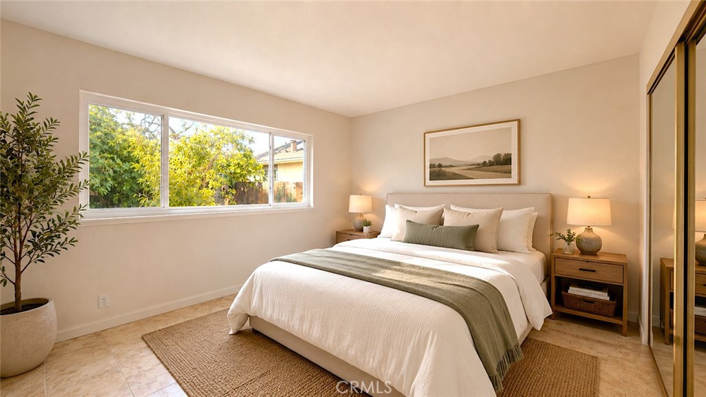 1150 3rd Street Gilroy, CA 95020 - Photo 16 of 28 a bedroom with a bed and a window