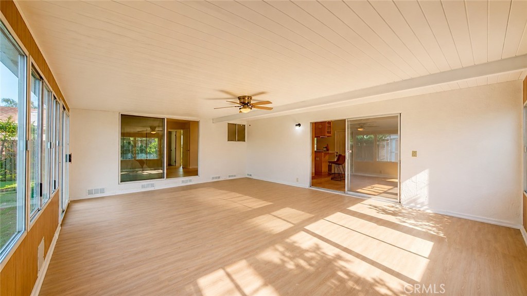1150 3rd Street Gilroy, CA 95020 - Photo 24 of 28 a view of empty room with wooden floor and fan