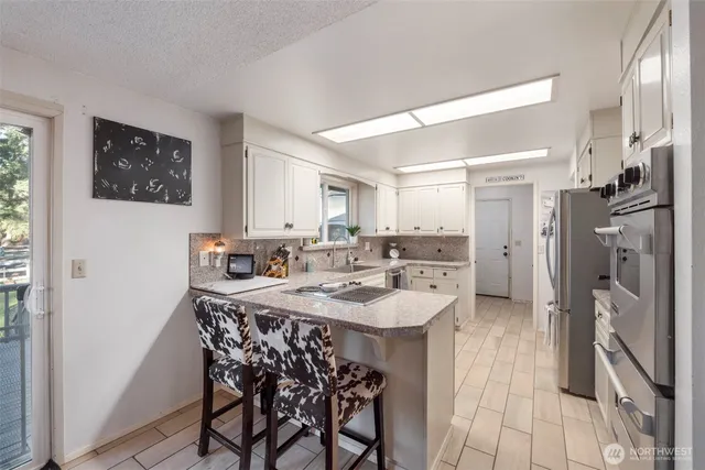 $815,000 | 1325 304th Street East, Roy, WA 98580