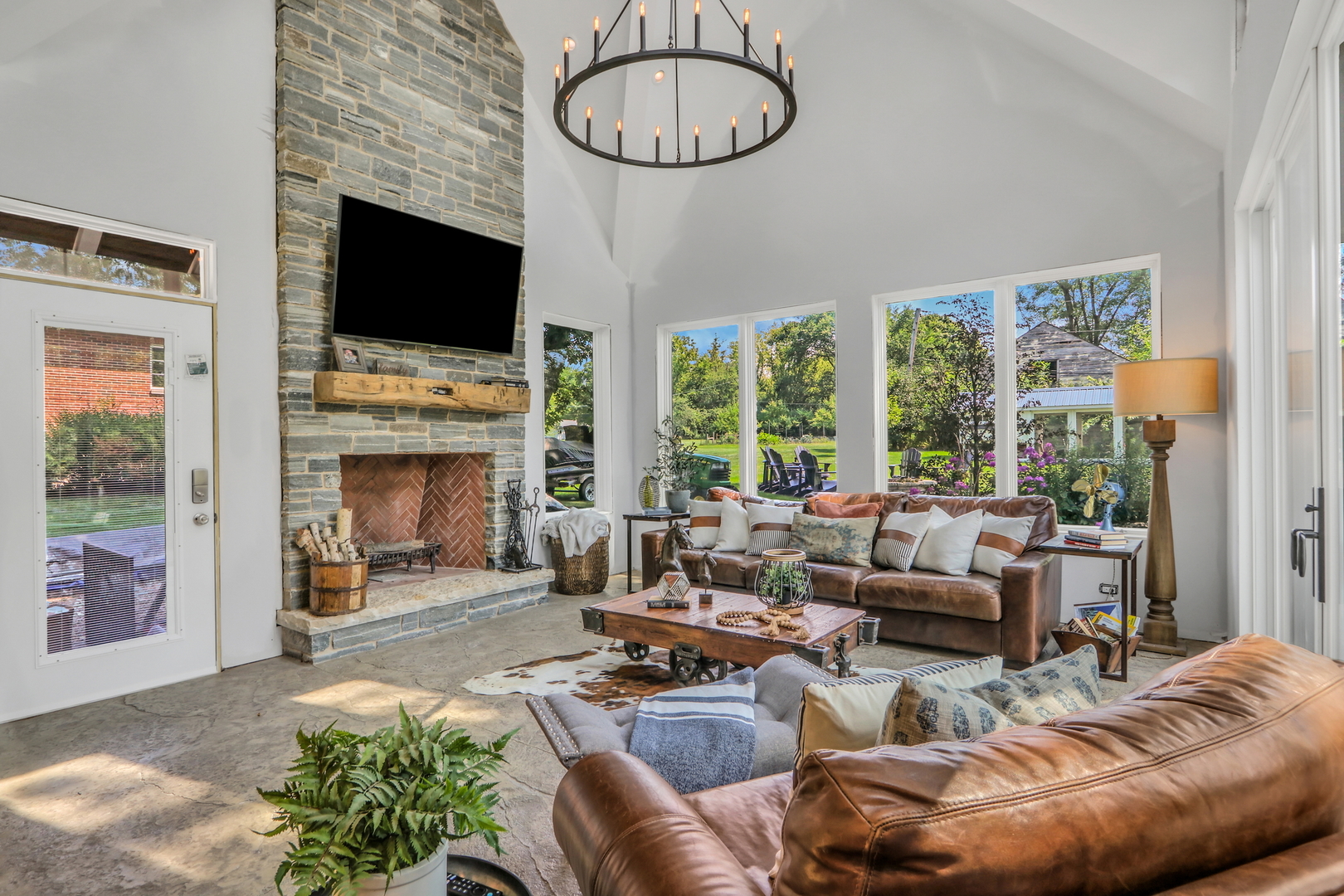 2238 Hanlon Road Libertyville, IL 60048 - Photo 11 of 72 a living room with furniture a fireplace and a flat screen tv