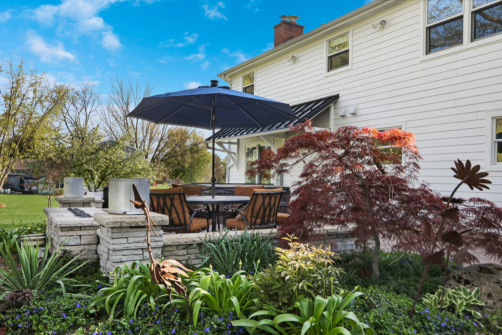 2238 Hanlon Road Libertyville, IL 60048 - Photo 15 of 72 a view of house with backyard outdoor seating and hardwood