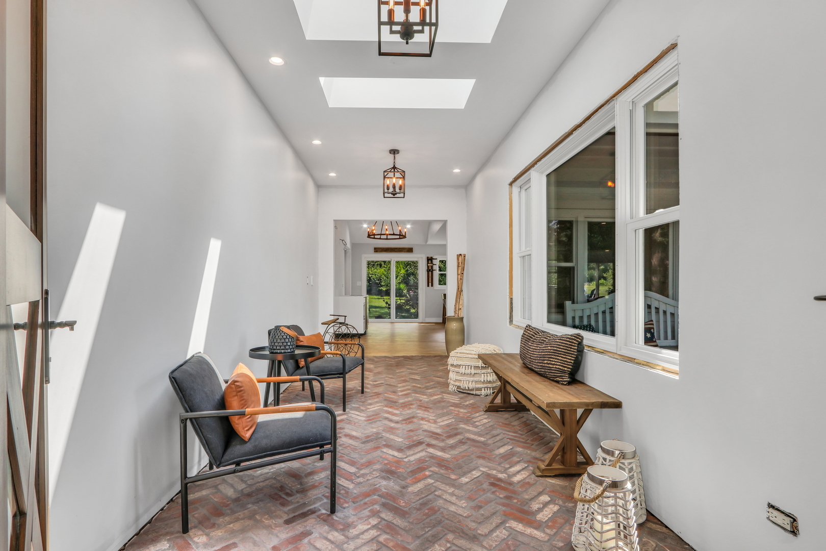 2238 Hanlon Road Libertyville, IL 60048 - Photo 21 of 72 a living room with furniture and floor to ceiling windows