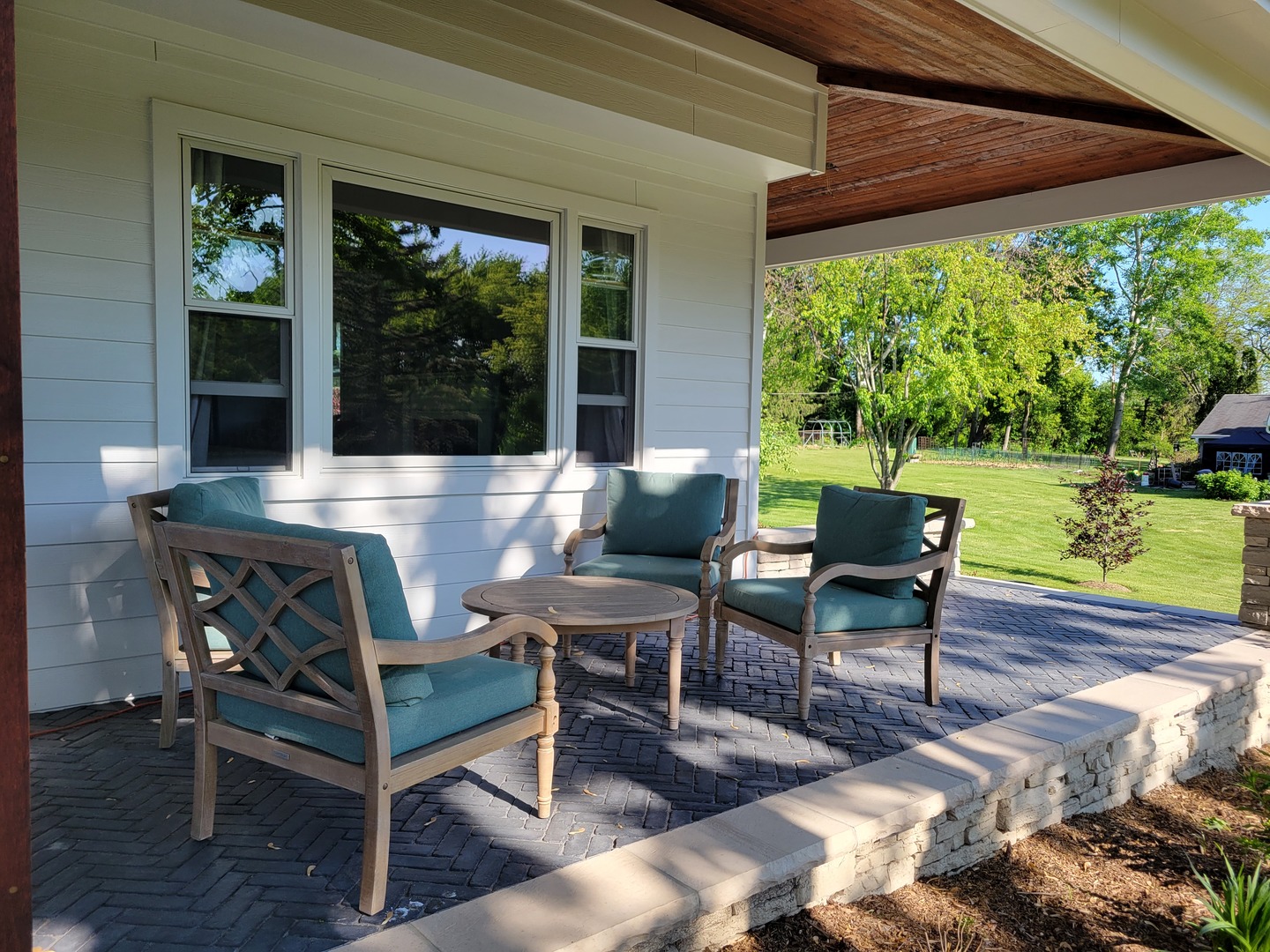 2238 Hanlon Road Libertyville, IL 60048 - Photo 23 of 72 a view of a patio with table and chairs potted plants with floor to ceiling window