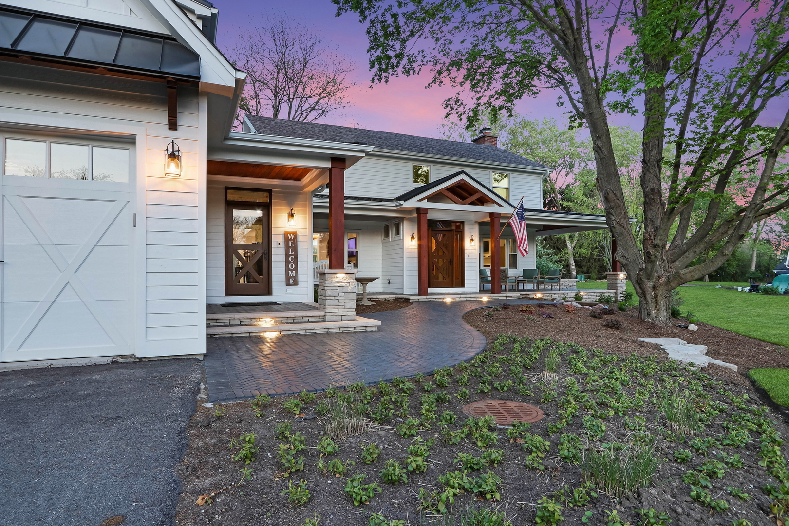 2238 Hanlon Road Libertyville, IL 60048 - Photo 34 of 72 a front view of a house with garden